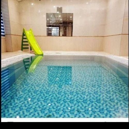 ویلای استخردارسرپوشیده اب گرم شاهنامه ۳۶|اجارهٔ کوتاه‌مدت ویلا و باغ|مشهد, امیریه|دیوار