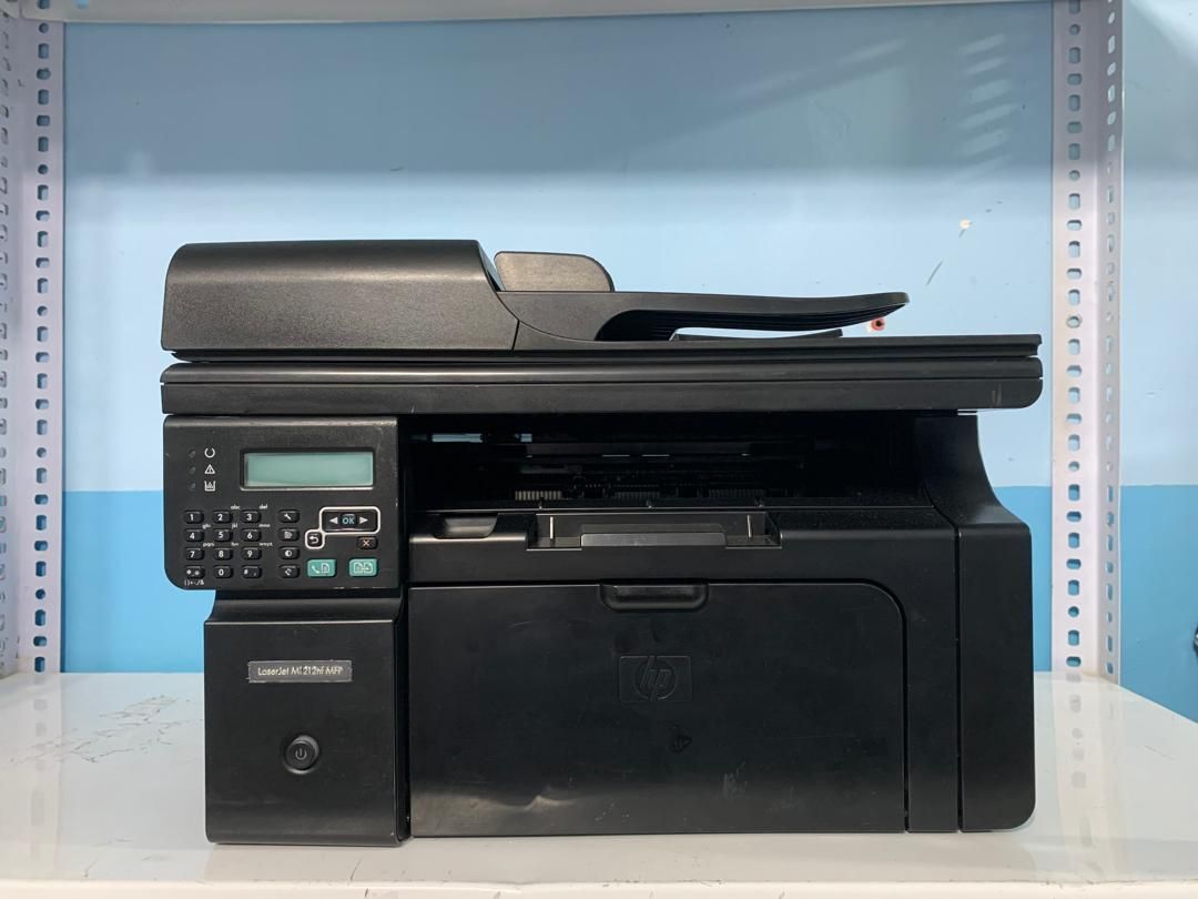 پرینتر استوک لیزری  HP Pro M1212NF|پرینتر، اسکنر، کپی، فکس|شیراز, لب آب|دیوار