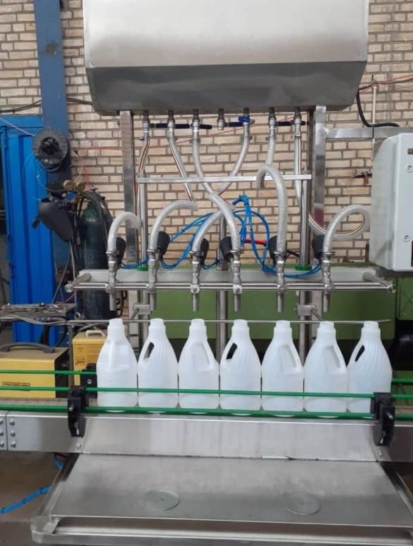 دستگاه پرکن دربند ثقلی پمپی ۴و۶و۸نازله خطی روتاری|ماشینآلات صنعتی|قدس, |دیوار