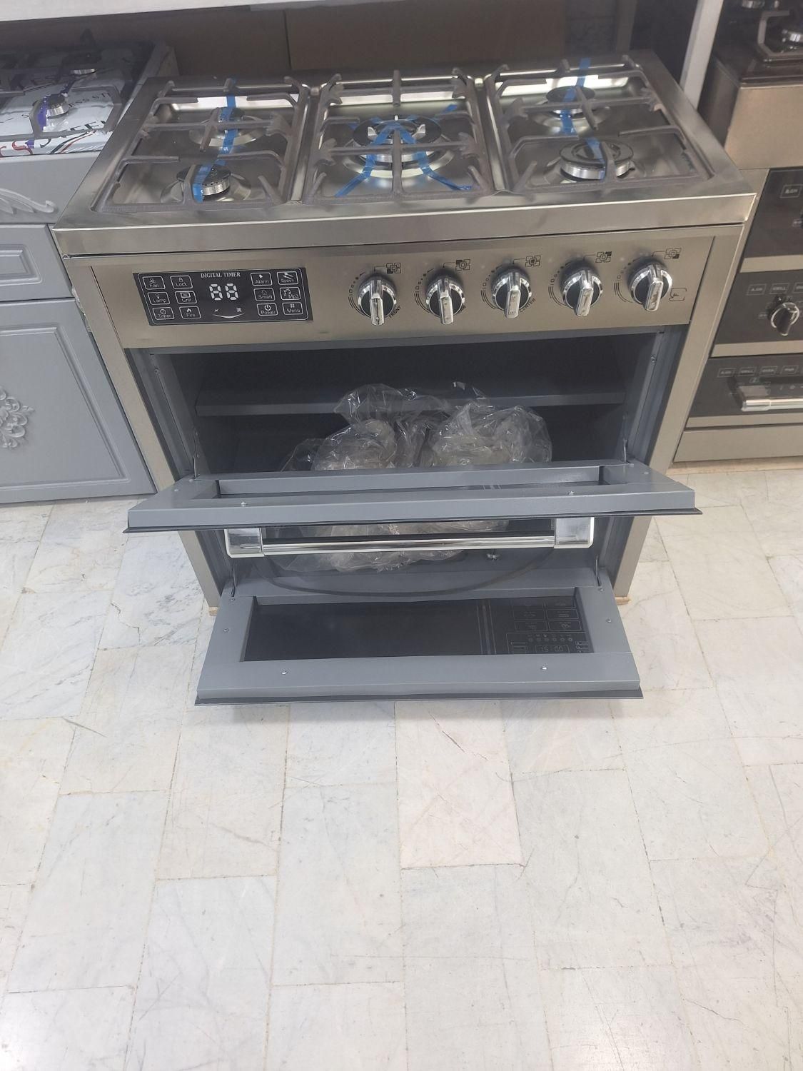 اجاق طرح فر نمااستیل صفحه استیل دودرب|اجاق گاز و لوازم برقی پختوپز|تهران, امین حضور|دیوار