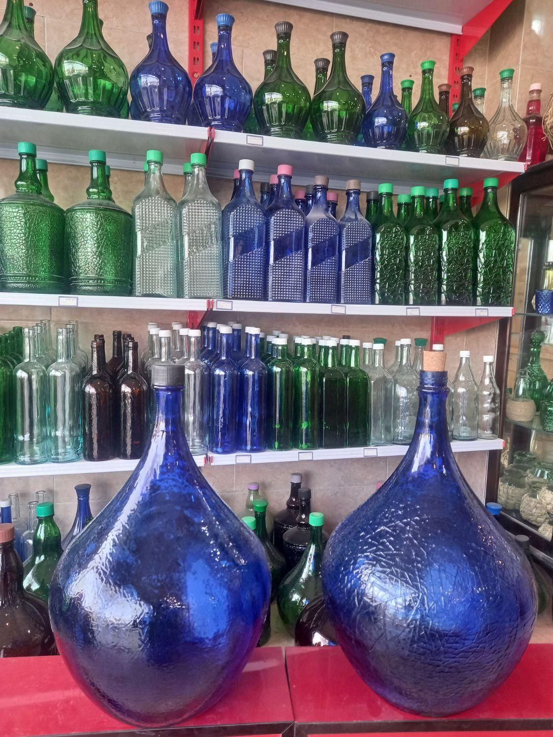بطری شیشه ای ۱۲ لیتری|ظروف نگهدارنده، پلاستیکی، یک‌بارمصرف|اصفهان, باغ فدک|دیوار