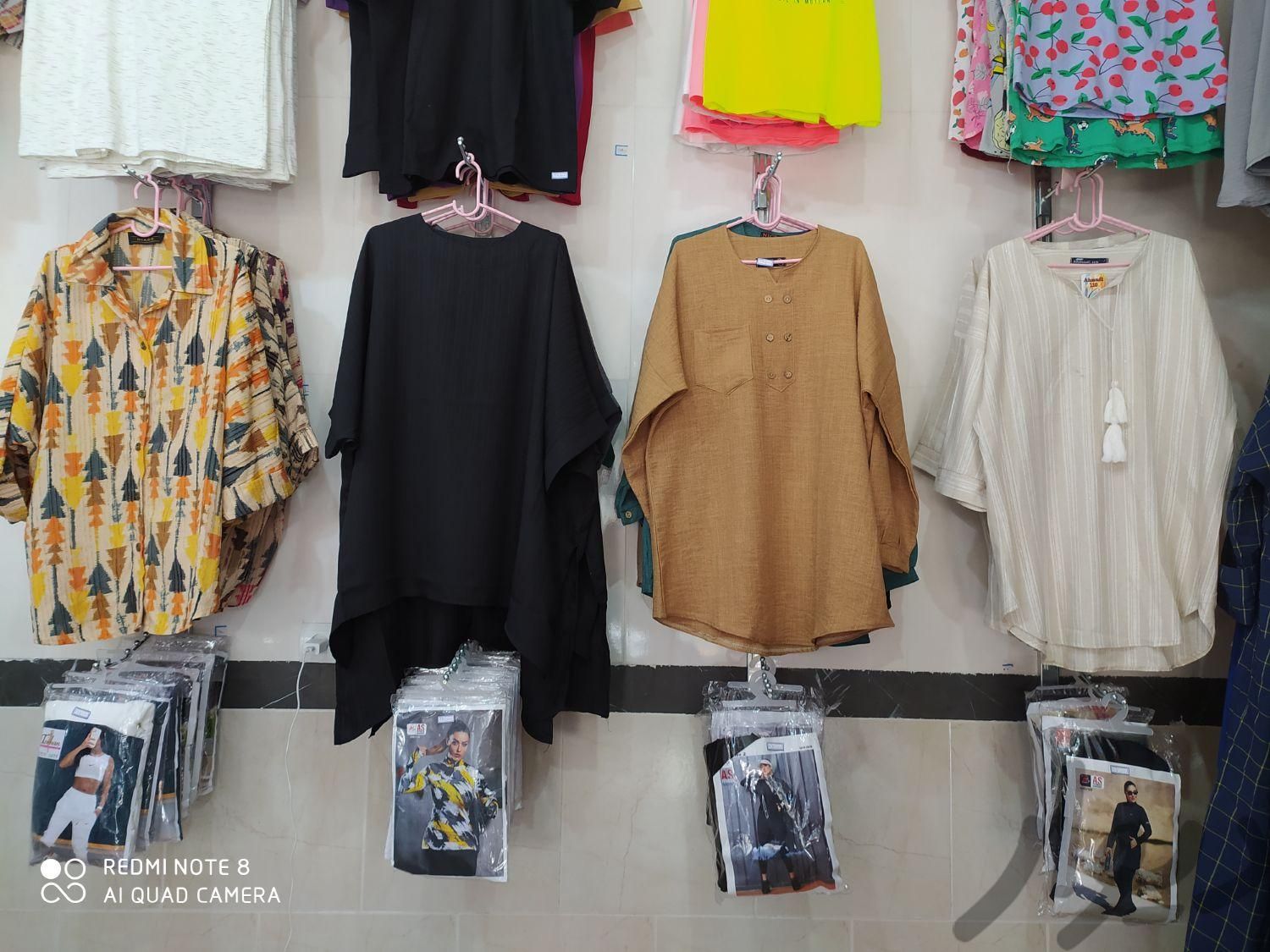پوشاک(بازار سرپوشیده،پوشاکی سوخته زاری)لباس|لباس|آبدانان, |دیوار