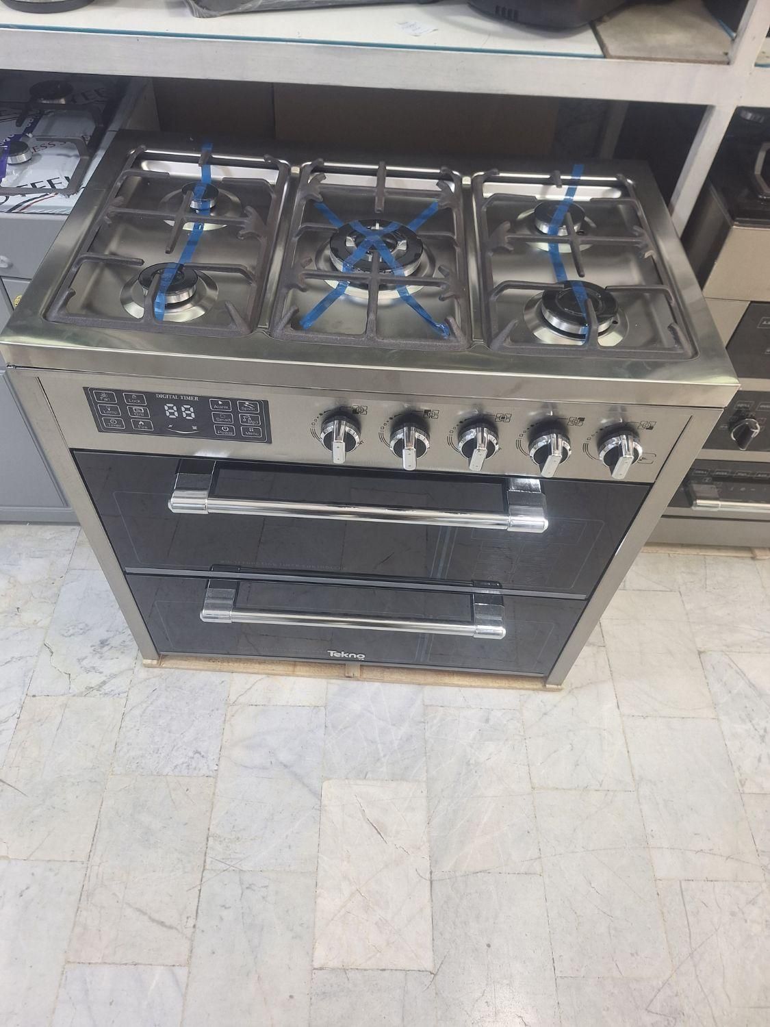 اجاق طرح فر نمااستیل صفحه استیل دودرب|اجاق گاز و لوازم برقی پختوپز|تهران, امین حضور|دیوار