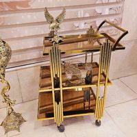 میز بار پذیرایی چرخ دار کالسکه ای فلزی طلایی پیانو|صنایع دستی و سایر لوازم تزئینی|تهران, حسن‌آباد باقرفر|دیوار
