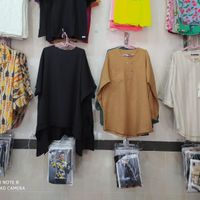 پوشاک(بازار سرپوشیده،پوشاکی سوخته زاری)لباس|لباس|آبدانان, |دیوار