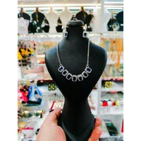 فروشگاه بدلیجات آمیتیس)نیمست مدل نگین آبی ونقره ای