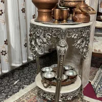 ساعت و میز برنزی