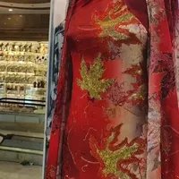 لباس پارچه مجلسی طلا کوب|لباس|بانه, |دیوار