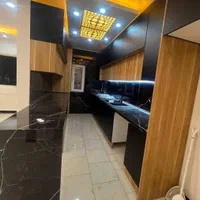 کابینت مات دو رنگ مشکی طرح چوب