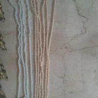 مهره خرجکار لباس ارزان