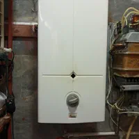 آبگرمکن دیواری بوتان سرویس شده