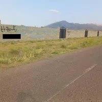 زمین باغ حصارکشی شده برجاده اصلی - صوفیان باغ وزیر