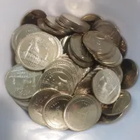 ۱۲۰ سکه صدتومنی بانکی و۷ تراول صدهزارتومانی
