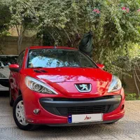 پژو‌۲۰۷ قرمز دنده‌ای سقف فلزی فرمان برقی مدل ۹۹|خودرو سواری و وانت|اصفهان, باغ کاران|دیوار