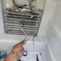 تعمیرات تخصص انواع یخچال.گاز شارژ رنگ نقاشی درب