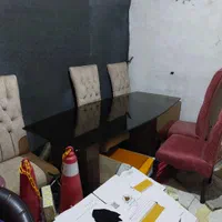 میز ناهار خوری ۶ نفره بیضی شکل شیشه دودی