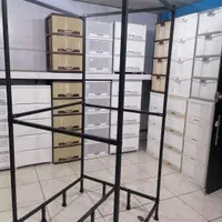 شلف دکور مغازه و رگال مدرن چوب و فلز|کتابخانه، شلف، قفسه‌های دیواری|شیراز, سینما سعدی|دیوار