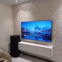 نصاب نصب تخصصی تلوزیون سنگین به روی دیوار