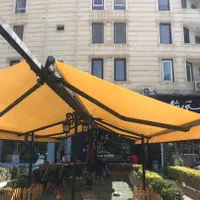 سایبون برقی.چتر باغی.سایبان برقی مغازه