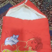 کیسه خواب ، روروئک و آغوشی نوزاد