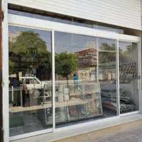 اجرای کرکره برقی و شیشه سکوریت
