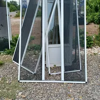 در پنجره دوجداره توری پلیسه کرکره برقی