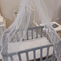 تخت کنار مادر