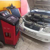 شارژ گاز کولر اتومبیل خودرو ماشین تعمیرات فنی کولر