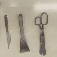 قیچی ودفته (شانه)قالی وقلاب قالی بافی