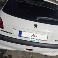 پژو ۲۰۶‌ تیپ ۵|خودرو سواری و وانت|قم, دروازه چوبی|دیوار