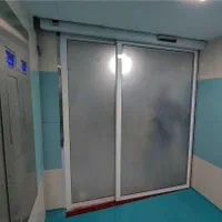 درب اتوماتیک شیشه ای اسلایدینگ با فریم استیل|خدمات پیشه و مهارت|چابکسر, |دیوار