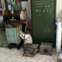 یک دستگاه اسپارک..ویک دستگاه تزریق پلاستیک
