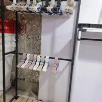شلف دکور مغازه و رگال مدرن چوب و فلز|کتابخانه، شلف، قفسه‌های دیواری|شیراز, سینما سعدی|دیوار