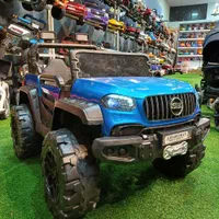 ماشین جیپ چهارموتوره پرقدرت رنگ متالیک گهواره ای