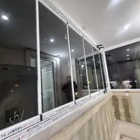 درب و پنجره و بالکن شیشه ای
