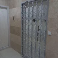 حفاظ کشویی درب اکاردیونی ضدسرقت ریلی فلزی آپارتمان|مصالح و تجهیزات ساختمان|مشهد, آزادشهر|دیوار