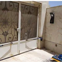 جک درب پارکینگ ریلی و بازویی جک درب پارکینگaz