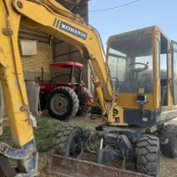 مینی بیل کوماتسو ۳ تن لاستیکی ۴ سیلندر