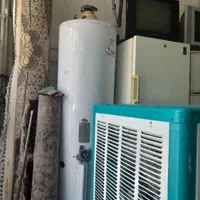 خریدارفرش سمساری ضایعاتی یخچال در پنچره آهنی