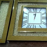 ساعت دیواری آینه ای شیک و مدرن