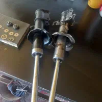 تعمیرانواع کمک فنرهای روغنزده ایرانی خارجی شارژکمک