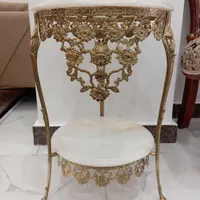 میز تلفن برنزی جنس خوب دو ماه گرفتیم