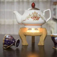 پایه قوری چوبی وارمر دار