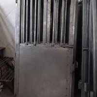 پنجره  حفاظ دار و درب اهنی سبک  انباری اسانسور