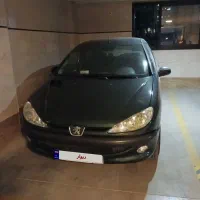 فروش فوری پژو ۲۰۶ مدل ۸۰ یشمی بعلت نبود پارکینگ