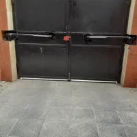 درب برقی پارکینگی،جک برقی بازویی و ریلی