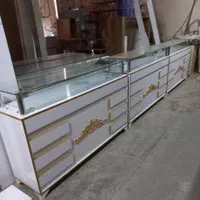 دکوراسیون مغازه استند ویترین پیشخوان