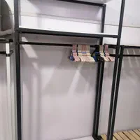 شلف دکور مغازه و رگال مدرن چوب و فلز|کتابخانه، شلف، قفسه‌های دیواری|شیراز, سینما سعدی|دیوار