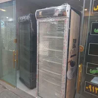 یخچال سفید و مشکی ایستاده همه طرح و فریزر ایستاده