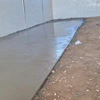 بتن ریزی با خلاطه دیزلی و ماله پروانه ای